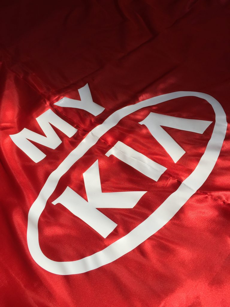 Car Reveal Kia 2 e1568956270370 | Banana Productions | Melbourne DTF Printing And Embroidery for Uniform Workwear Sportswear Specialist